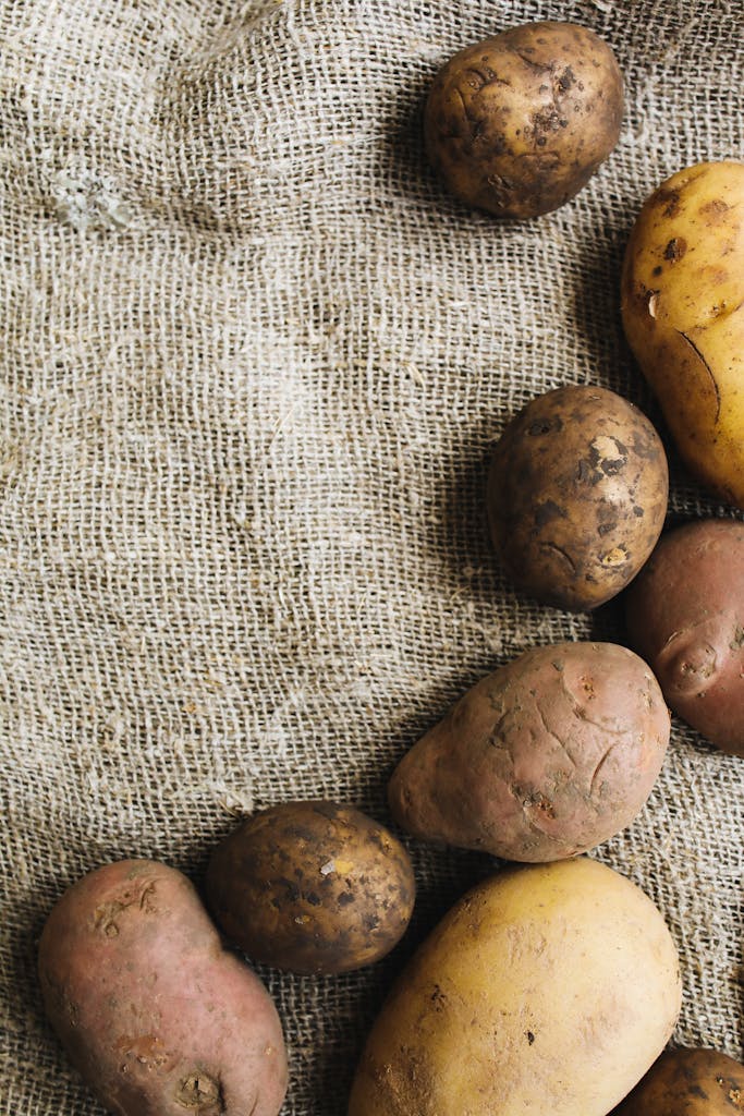 Photo Of Potatoes On Top Of Rice Sack